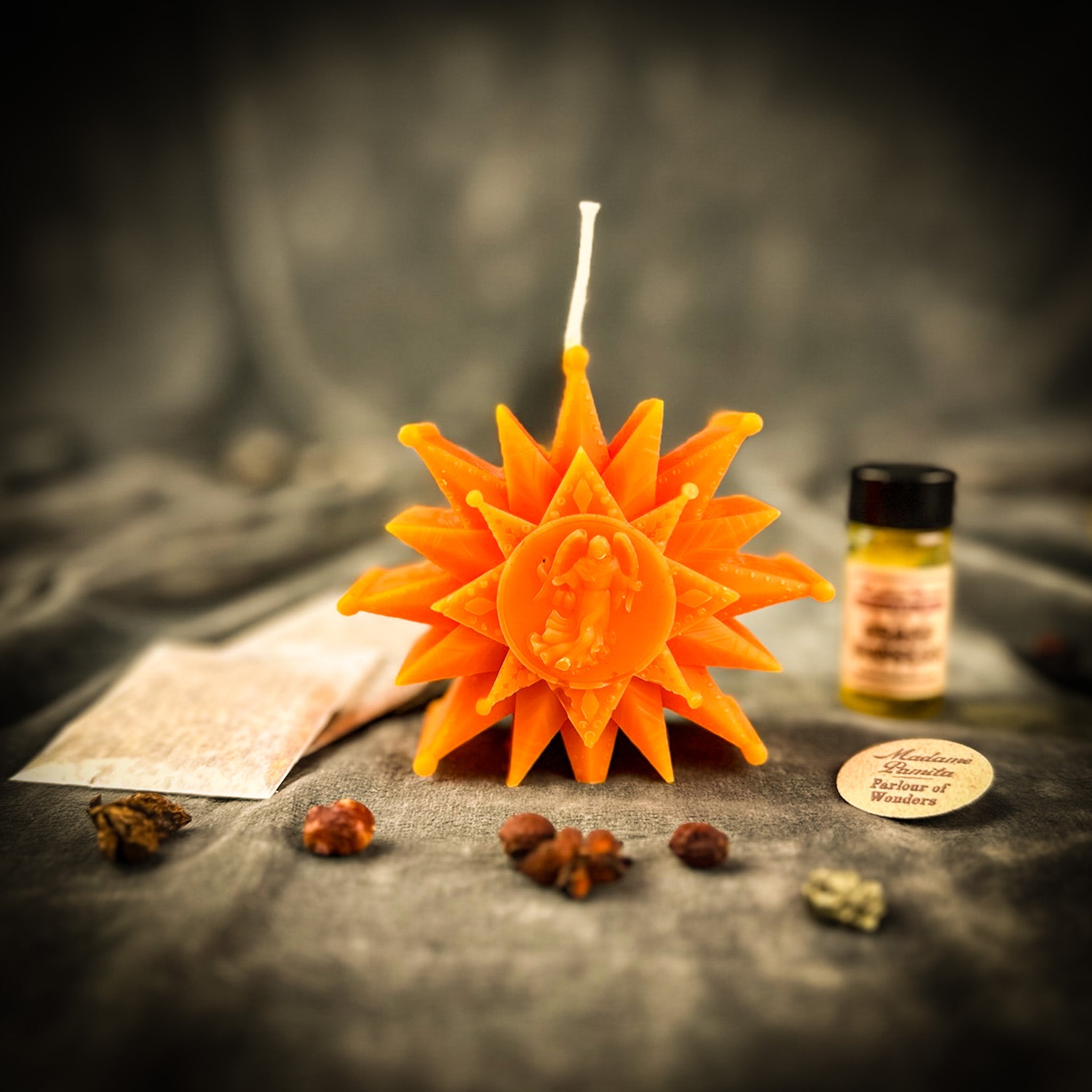 Winter Wishing Star Candle Spell Kit by Parlour of Wonders with orange candles for new beginnings and winter magic.