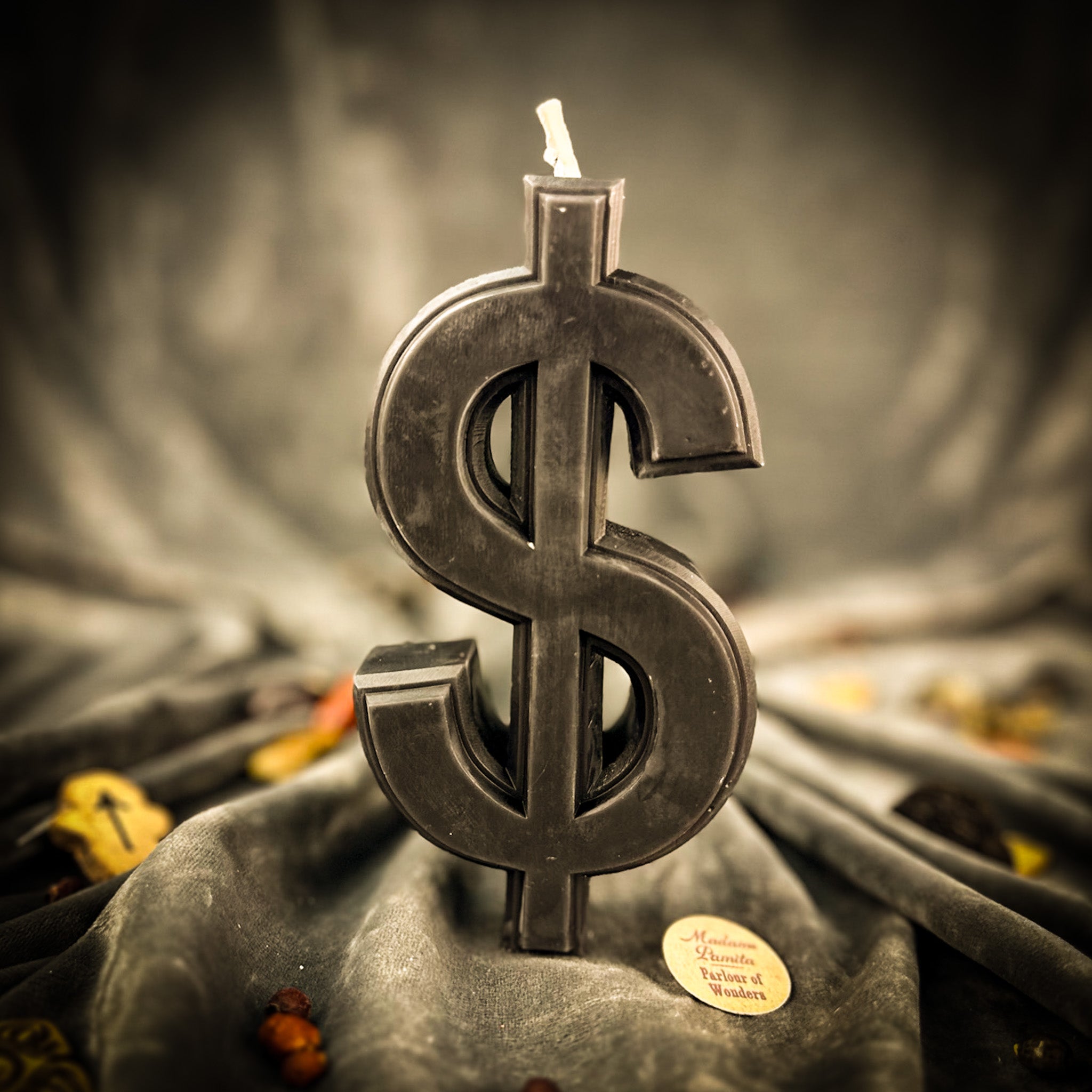 Orange Dollar Sign Candle Spell Kit from Parlour of Wonders for wealth and luxury magic, featuring candles and spell ingredients.