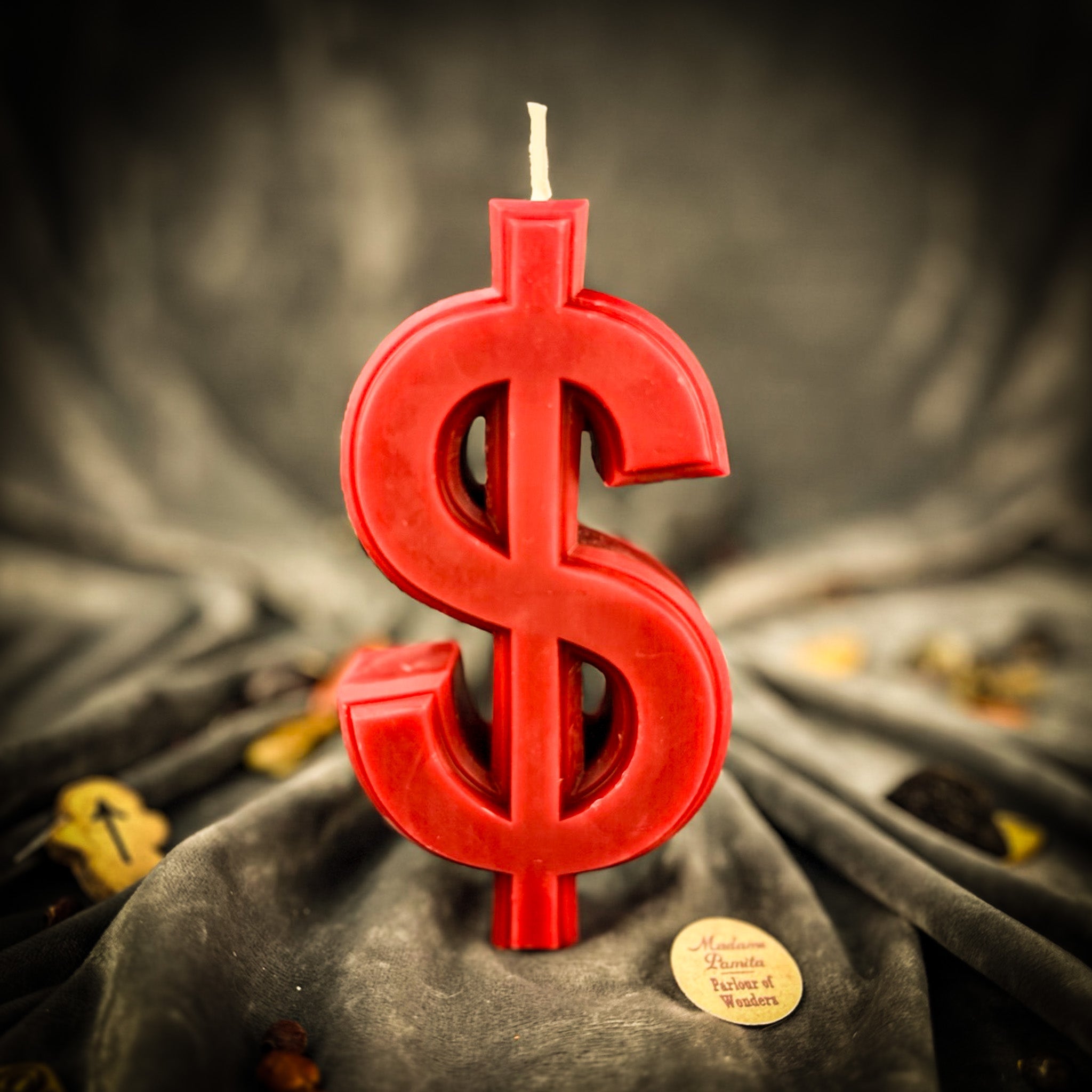 Orange Dollar Sign Candle Spell Kit for wealth and luxury magic, featuring candles and spell accessories from Parlour of Wonders.