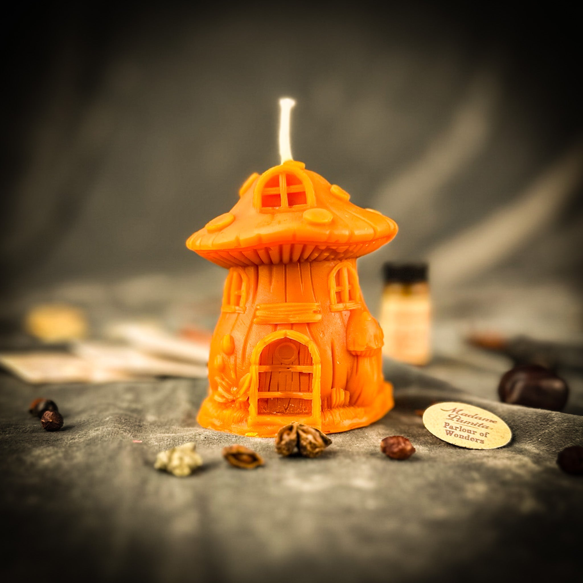 Cleansing Mushroom Fairy Hut Candle Spell Kit by Parlour of Wonders with orange candles for purification and renewal magic.