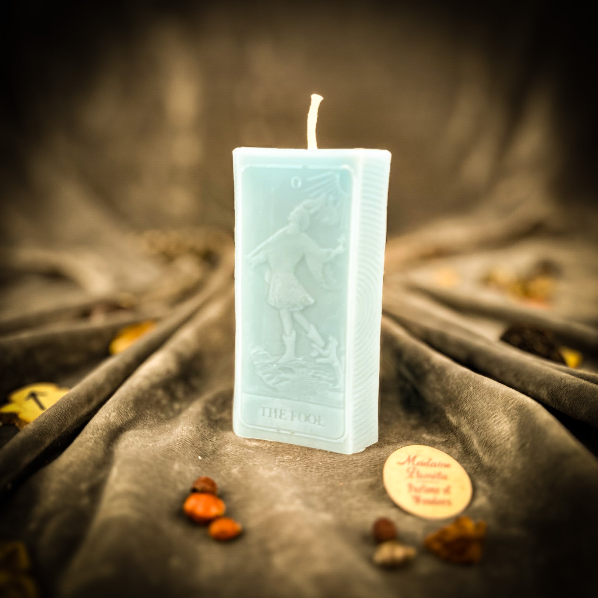 Parlour of Wonders Fool Candle Spell Kit with orange candles for new beginnings and adventure magic, featuring mystical symbols.