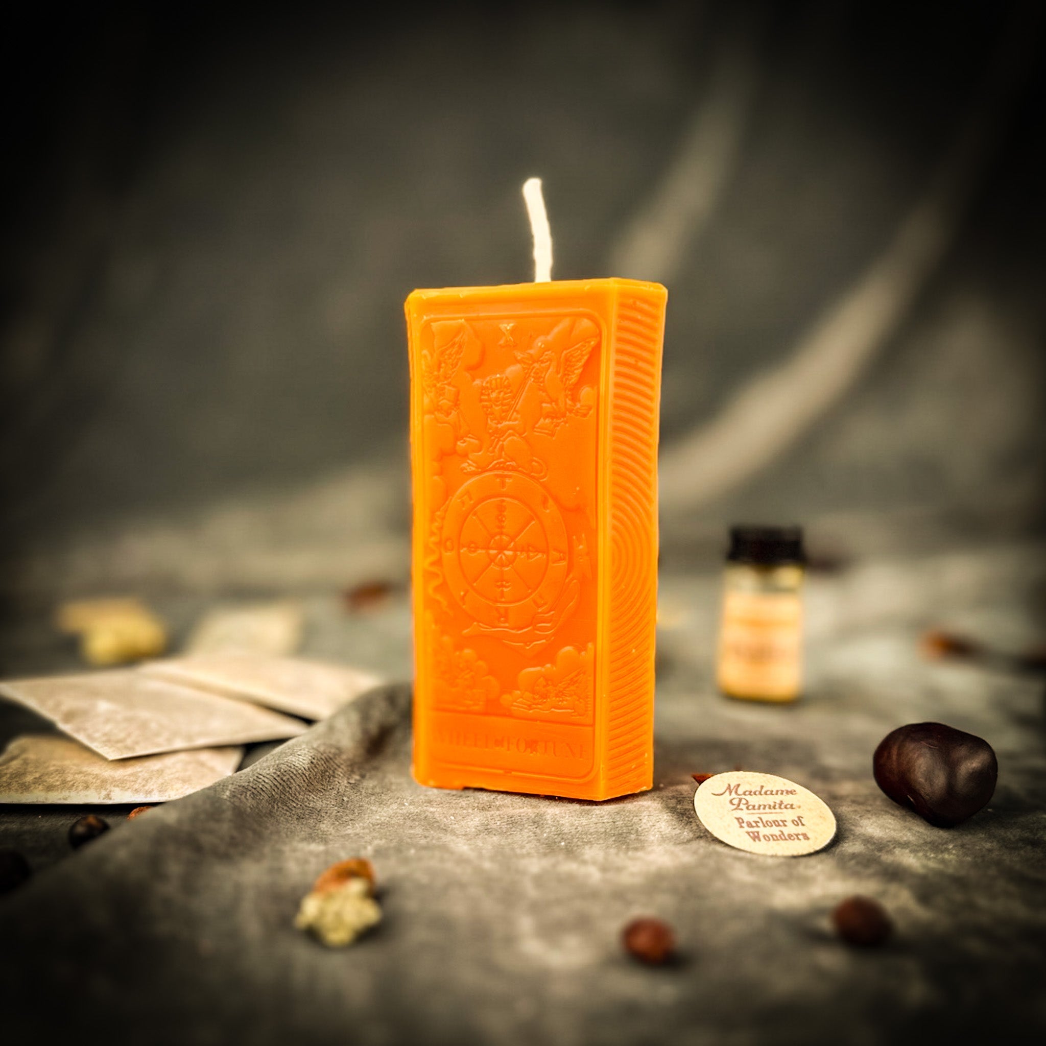Orange Wheel of Fortune Candle Spell Kit by Parlour of Wonders for luck and opportunity magic, including candles and spell components.