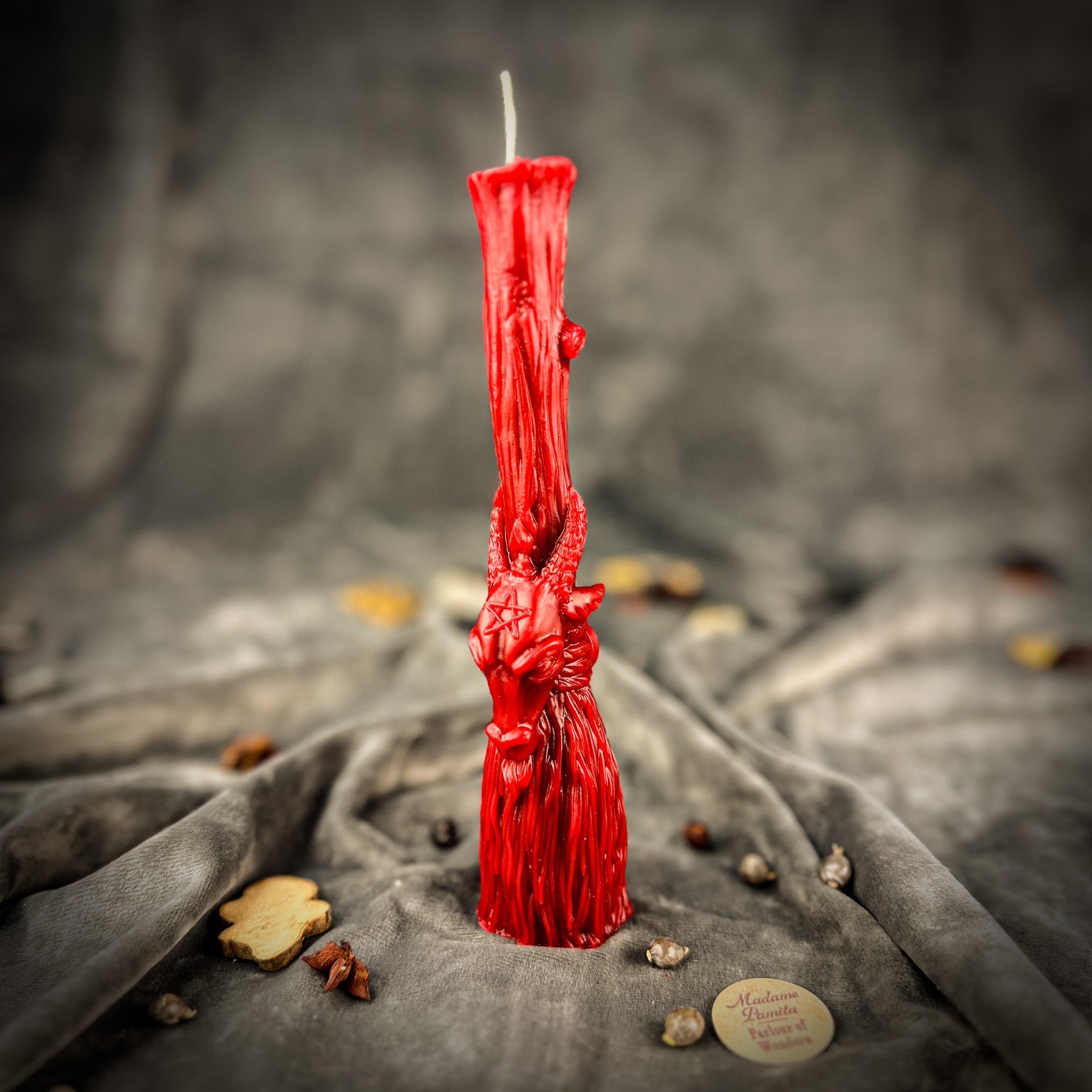 Sacred Goat Broom Candle Spell Kit by Parlour of Wonders with orange candles for banishing and protection rituals.