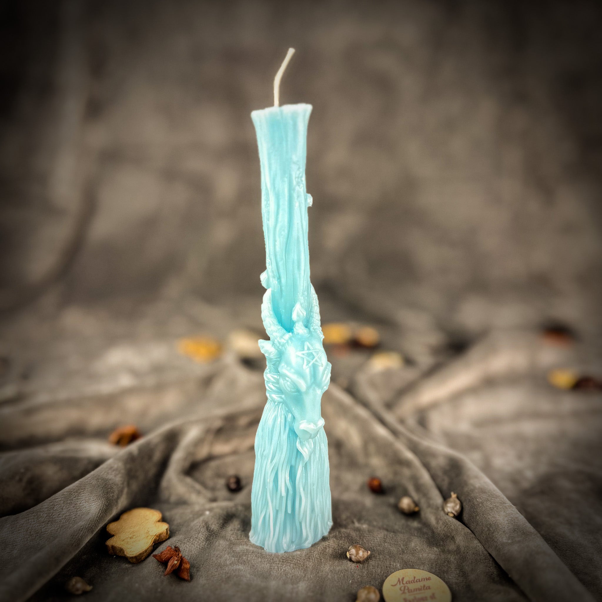 Sacred Goat Broom Candle Spell Kit by Parlour of Wonders with orange candles for banishing and protection spells.