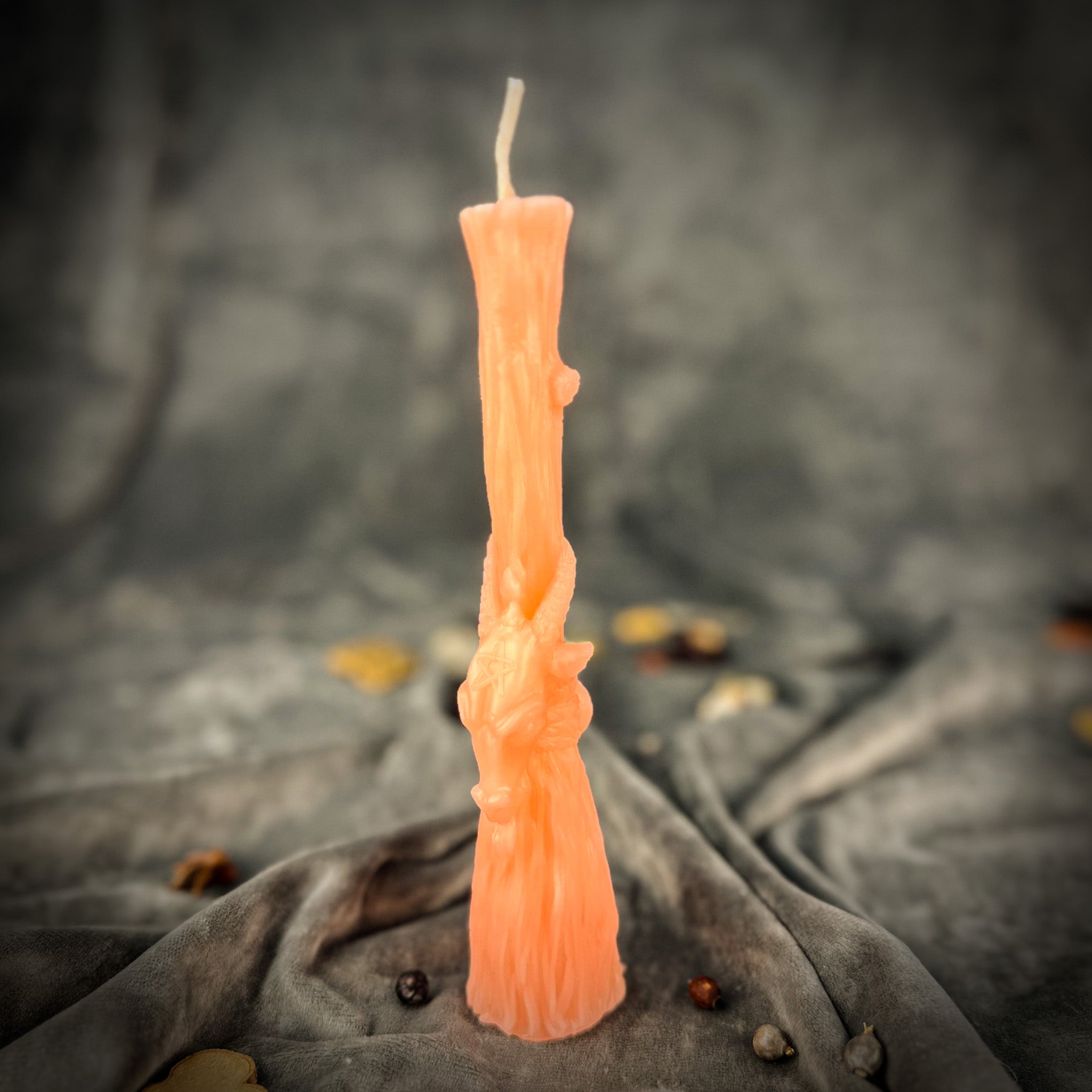 Sacred Goat Broom Candle Spell Kit by Parlour of Wonders featuring orange candles for banishing and protection rituals.