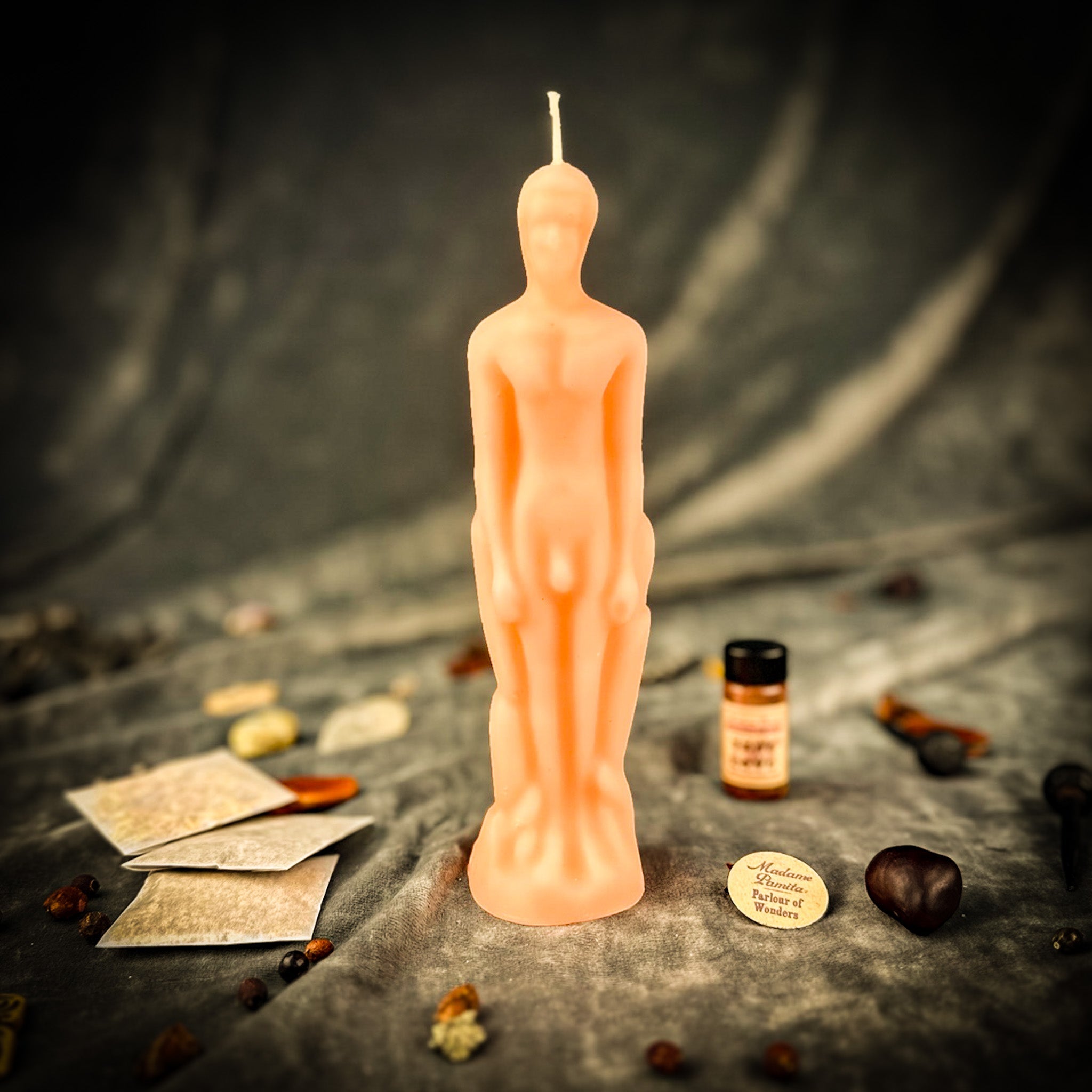 Pink male figural candle and spell kit for sympathetic magic and personal power from Parlour of Wonders Candle Spell Kit collection.