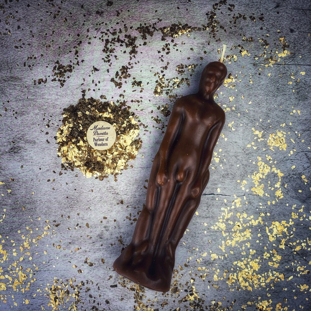 Pink male figural candle from Parlour of Wonders Candle Spell Kit for sympathetic magic and personal power rituals.