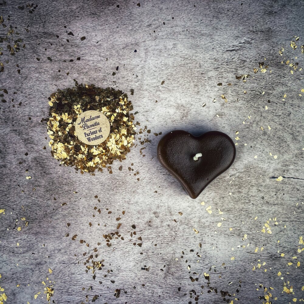 Mini Heart Candle Spell Kit by Parlour of Wonders featuring pink candles for love influence and emotional healing magic.