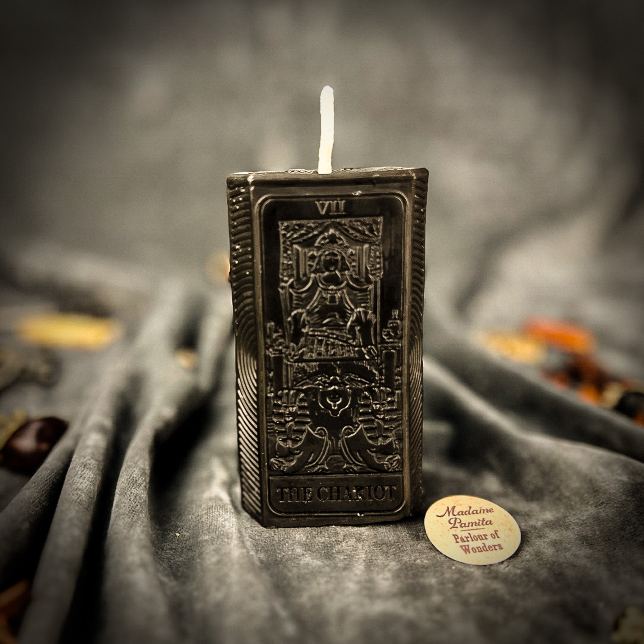 Purple Candle Spell Kit by Parlour of Wonders featuring candles for victory and determination magic in a decorative box.