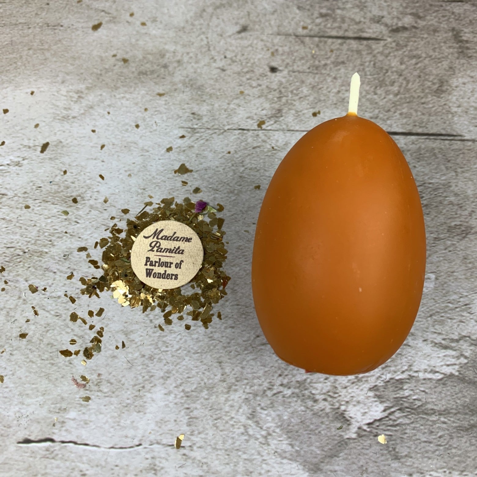 Purple Egg Talisman Candle Spell Kit by Parlour of Wonders for new beginnings and fertility magic, featuring candles and mystical symbols.
