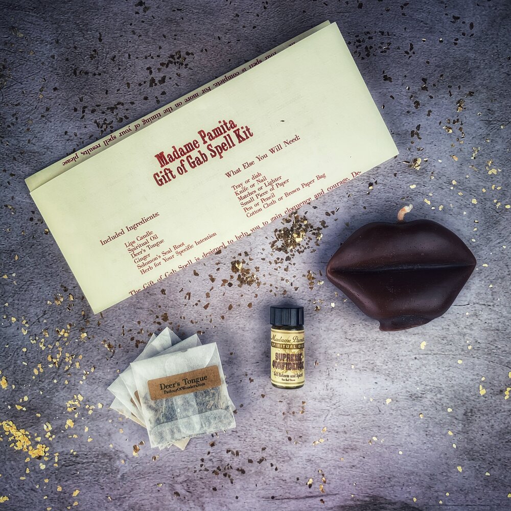Parlour of Wonders Gift of Gab Candle Spell Kit with purple candles for eloquent speech and powerful communication.