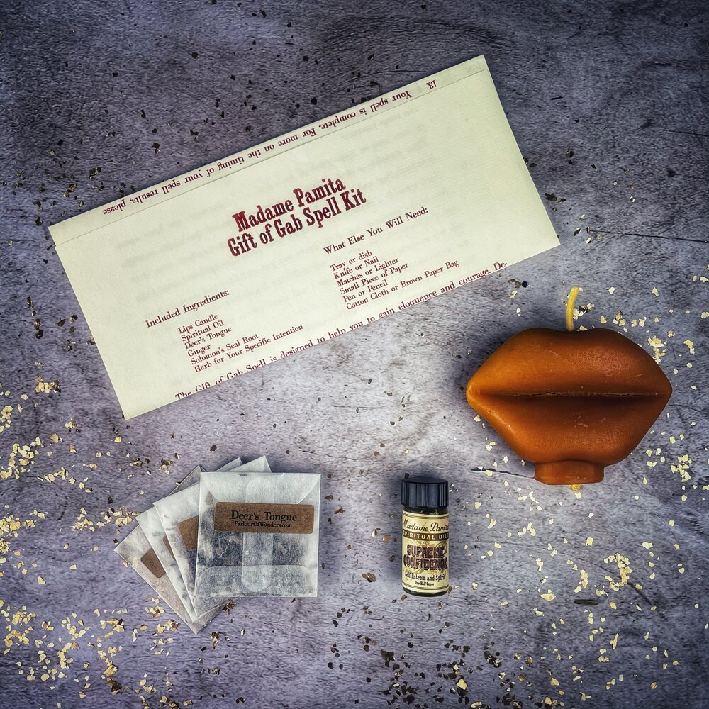 Parlour of Wonders Gift of Gab Candle Spell Kit with purple candles for eloquent speech and powerful communication.