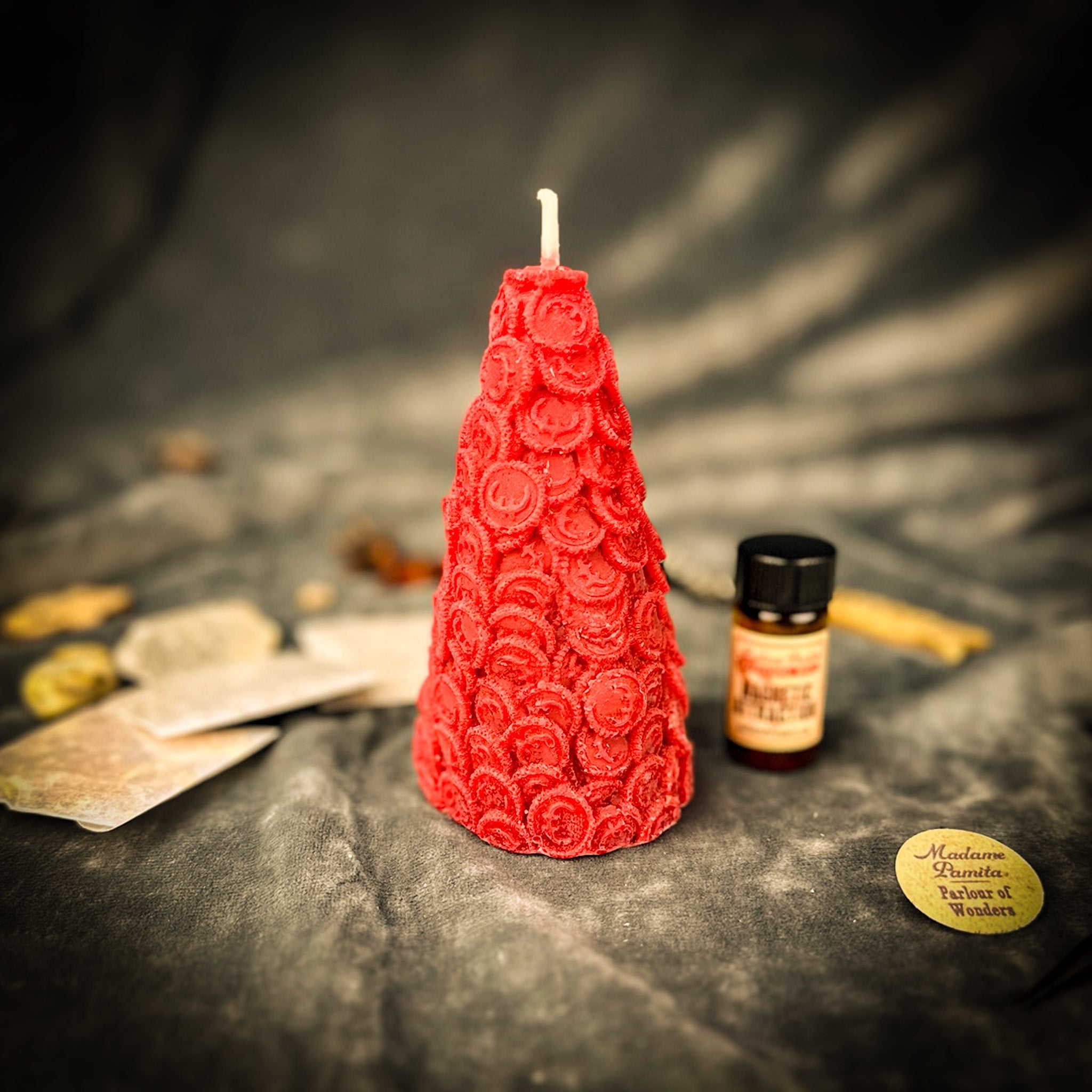 Red Cone of Coins Candle Spell Kit by Parlour of Wonders for money attraction and prosperity magic, with candles and spell components.