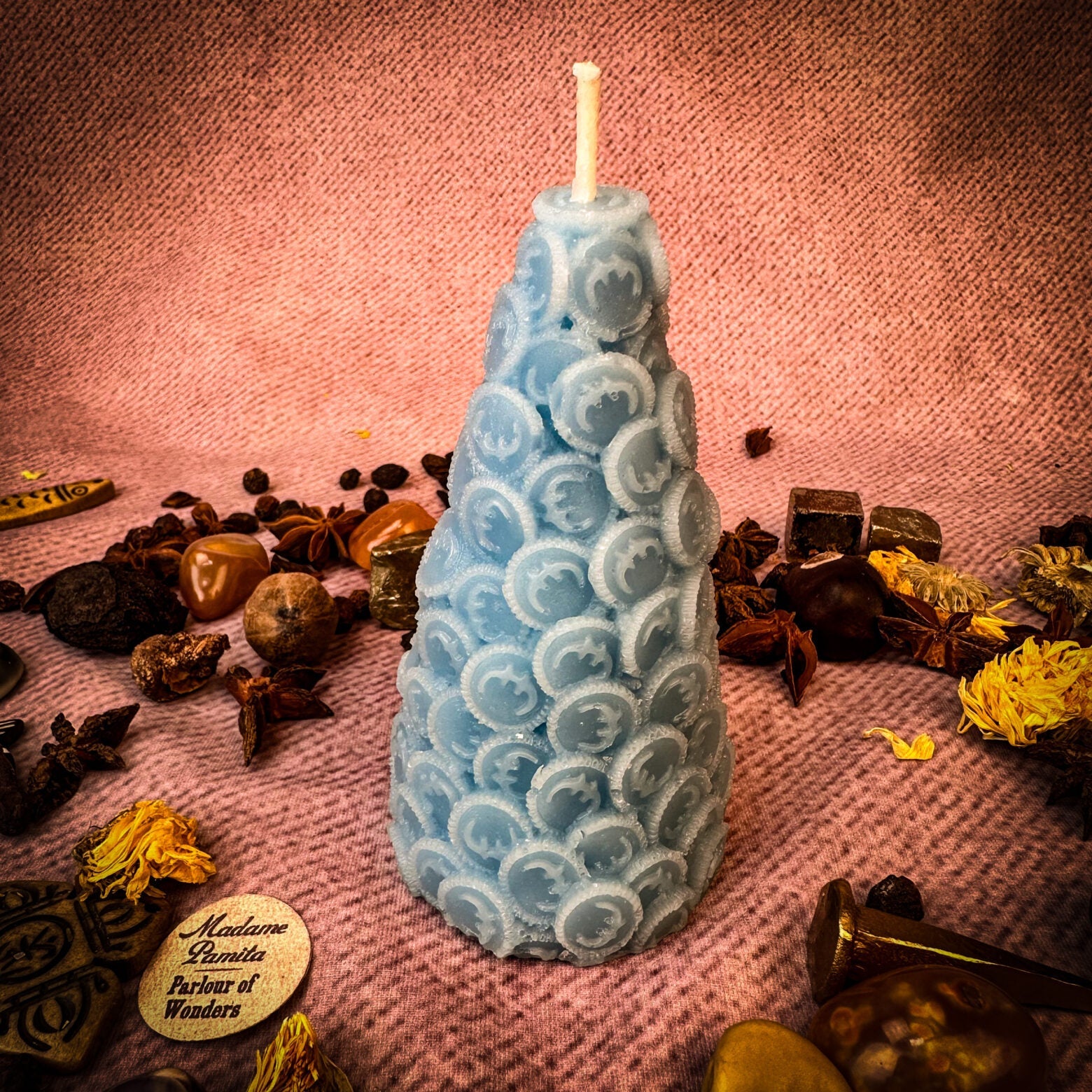 Red Cone of Coins Candle Spell Kit by Parlour of Wonders for money attraction and prosperity magic, featuring candles and ritual tools.
