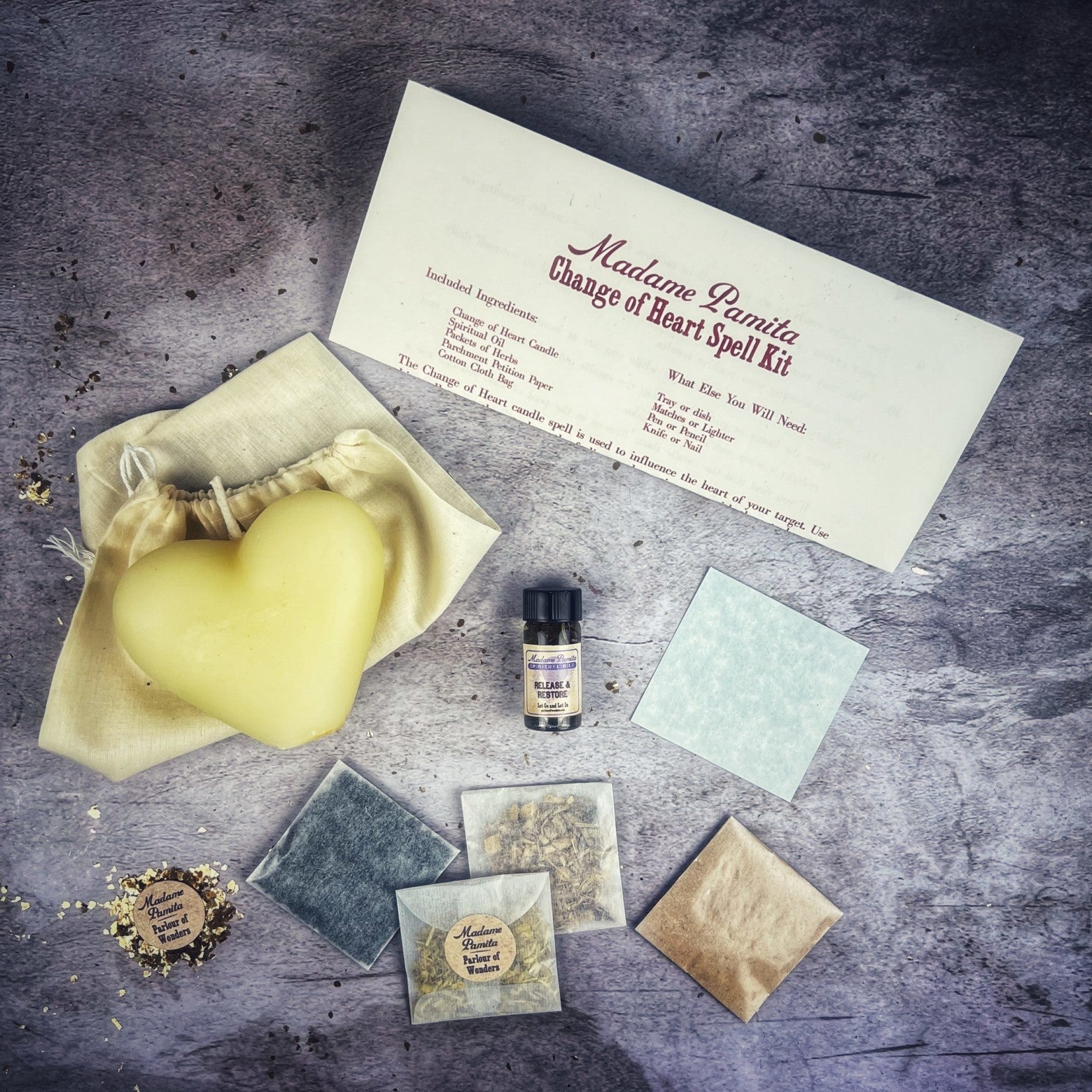 Red Candle Spell Kit by Parlour of Wonders for love reconciliation and emotional healing, includes candles and spell accessories.