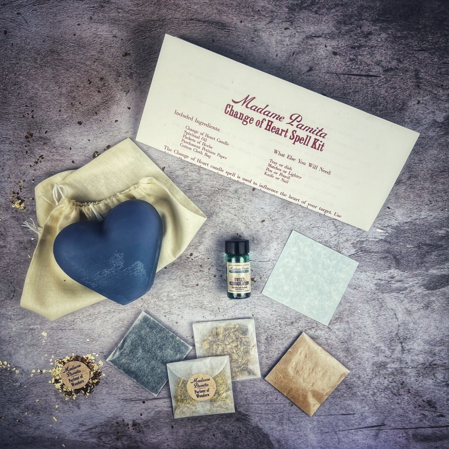Parlour of Wonders Change of Heart Candle Spell Kit with red candles for love reconciliation and emotional healing.