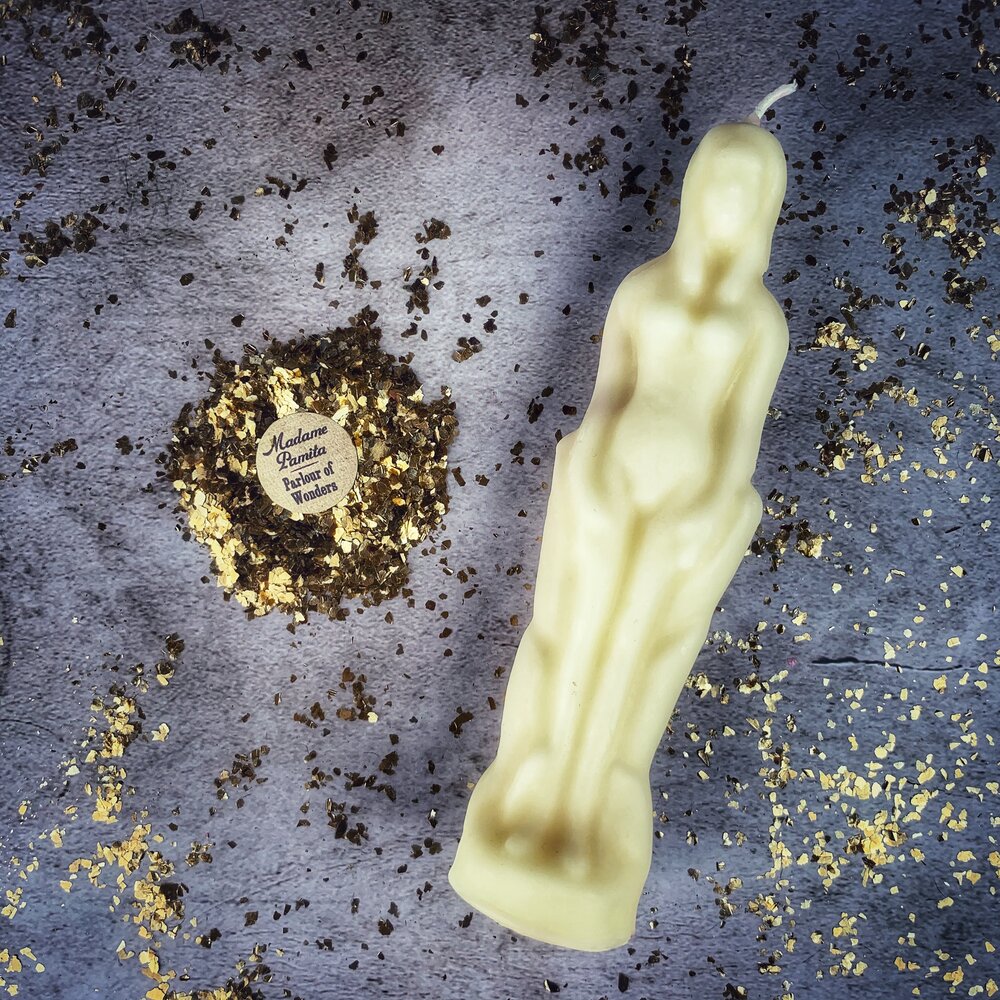 Red female figural candle from Parlour of Wonders Candle Spell Kit for sympathetic magic and personal power rituals.