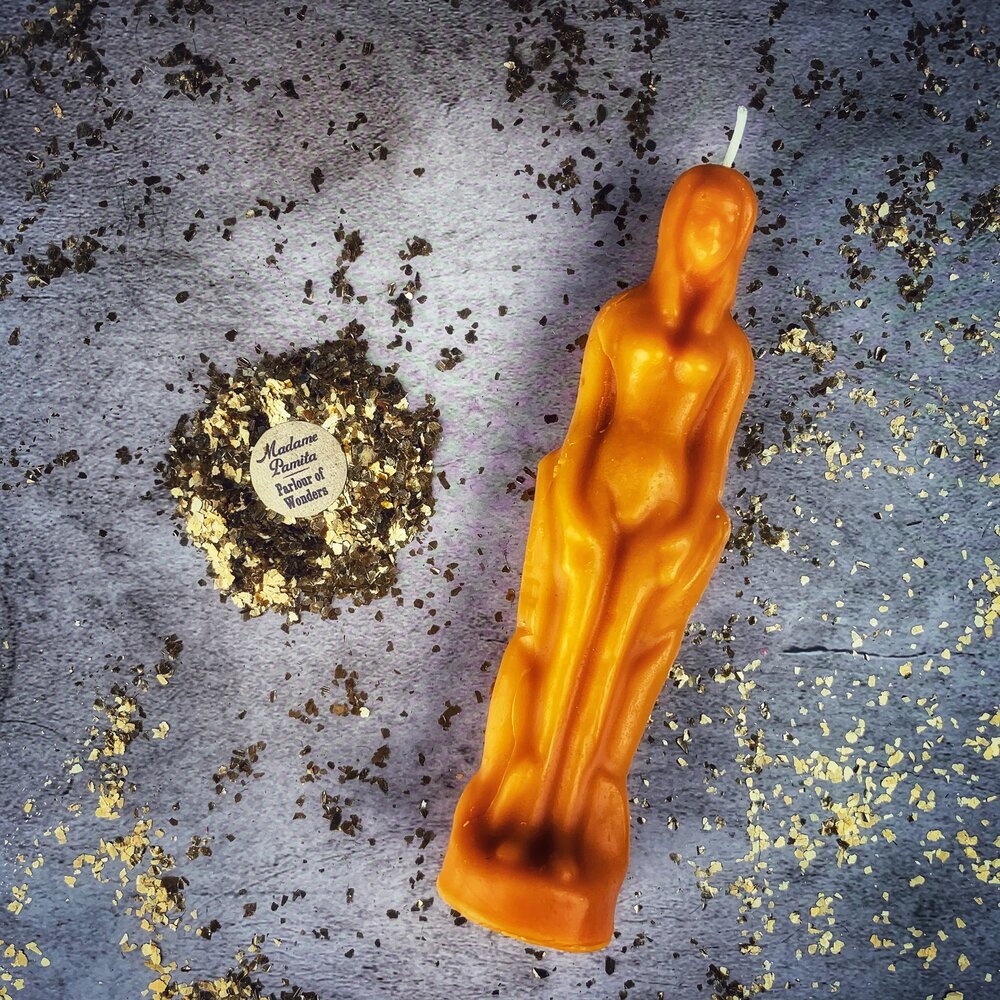 Red female figural candle from Parlour of Wonders Candle Spell Kit for sympathetic magic and personal power rituals.