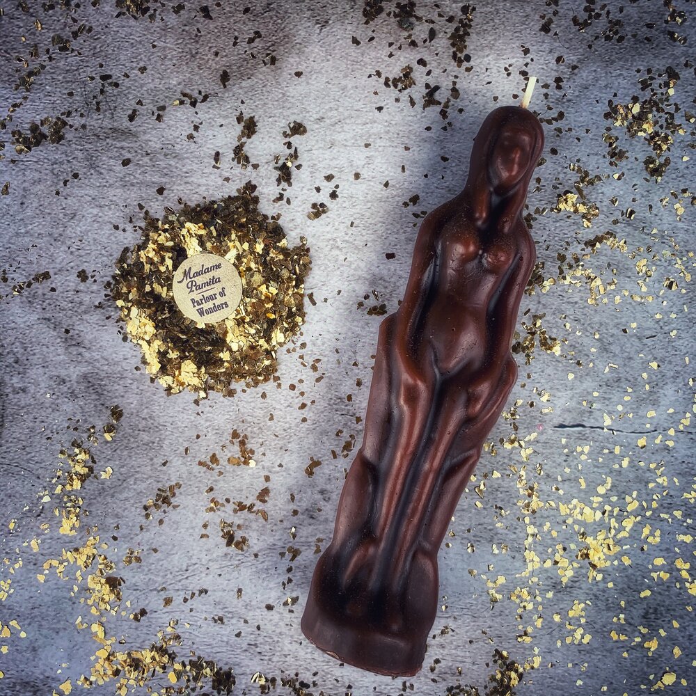 Red female figural candle from Parlour of Wonders Candle Spell Kit for sympathetic magic and personal power rituals.