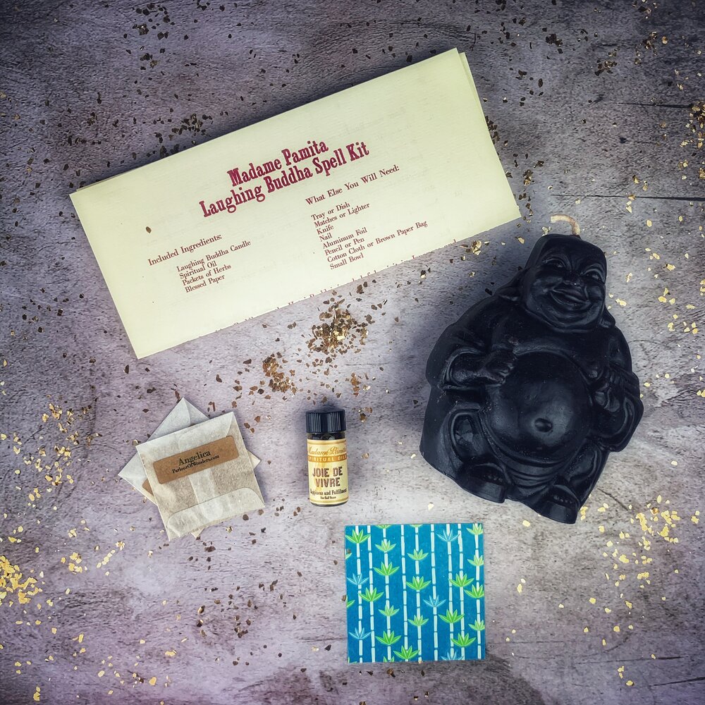 Red Passion Laughing Buddha Candle Spell Kit from Parlour of Wonders for abundance, wealth, luck, and prosperity magic.