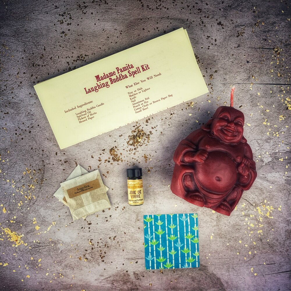 Red Passion Laughing Buddha Candle Spell Kit by Parlour of Wonders for abundance, wealth, luck, and prosperity magic.