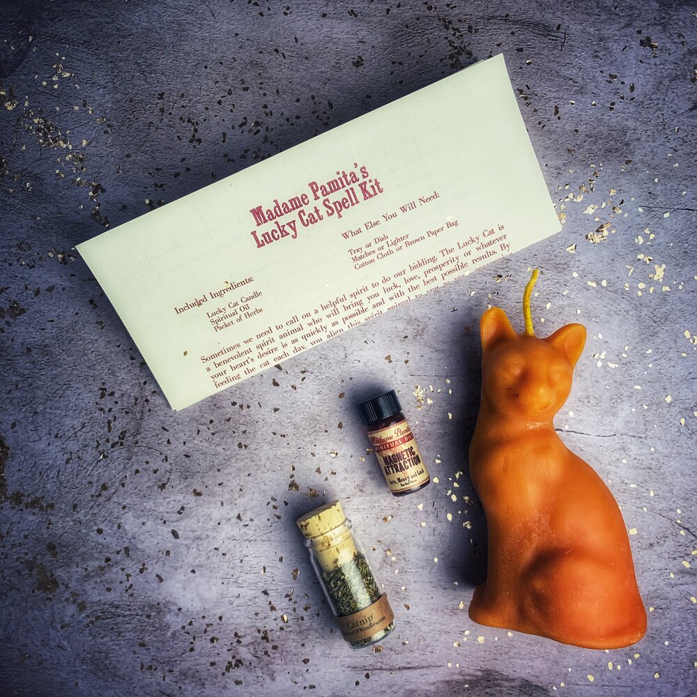 Red Lucky Cat Candle Spell Kit by Parlour of Wonders, featuring candles and magic tools for fast action and manifestation.