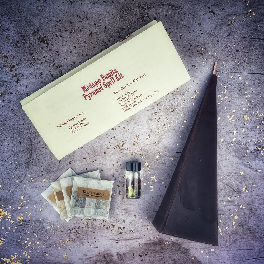 Red Pyramid of Power Candle Spell Kit by Parlour of Wonders with candles and ritual tools for success and stability.
