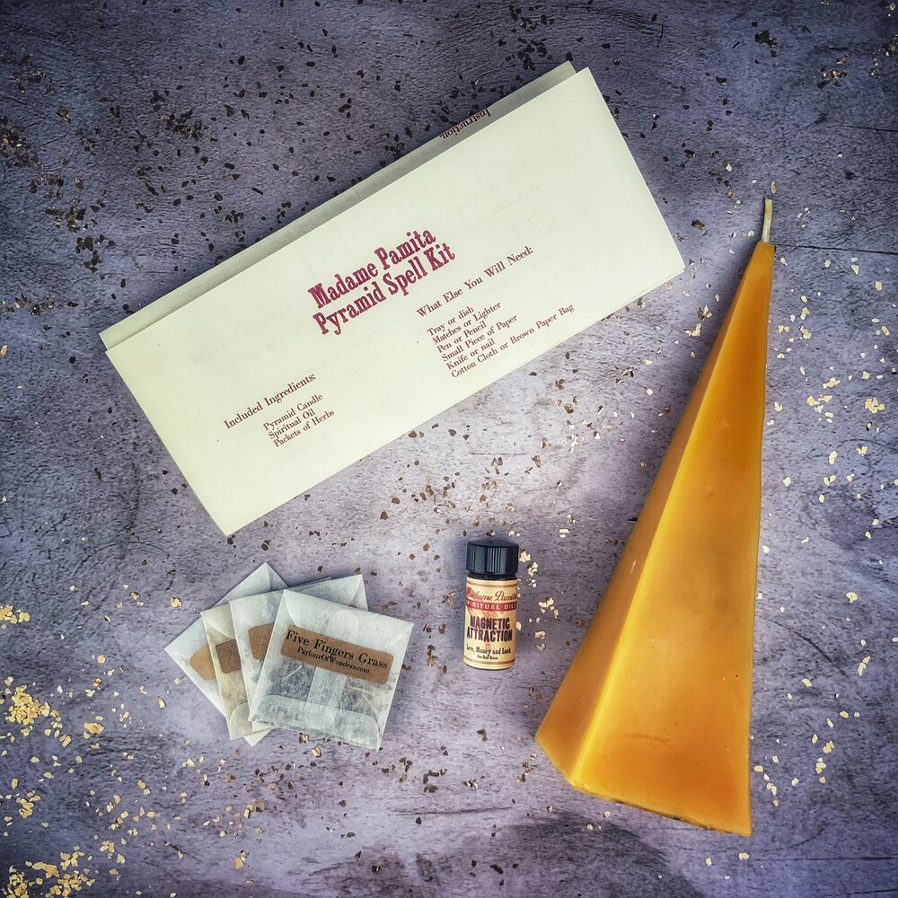 Red Pyramid of Power Candle Spell Kit by Parlour of Wonders with candles, herbs, and tools for success and stability magic.