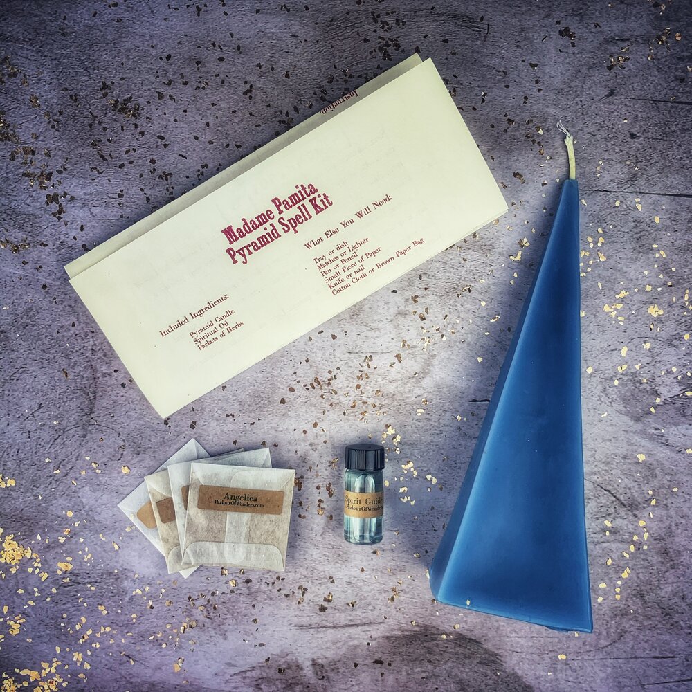 Red Pyramid of Power Candle Spell Kit by Parlour of Wonders with candles and ritual tools for success and stability.