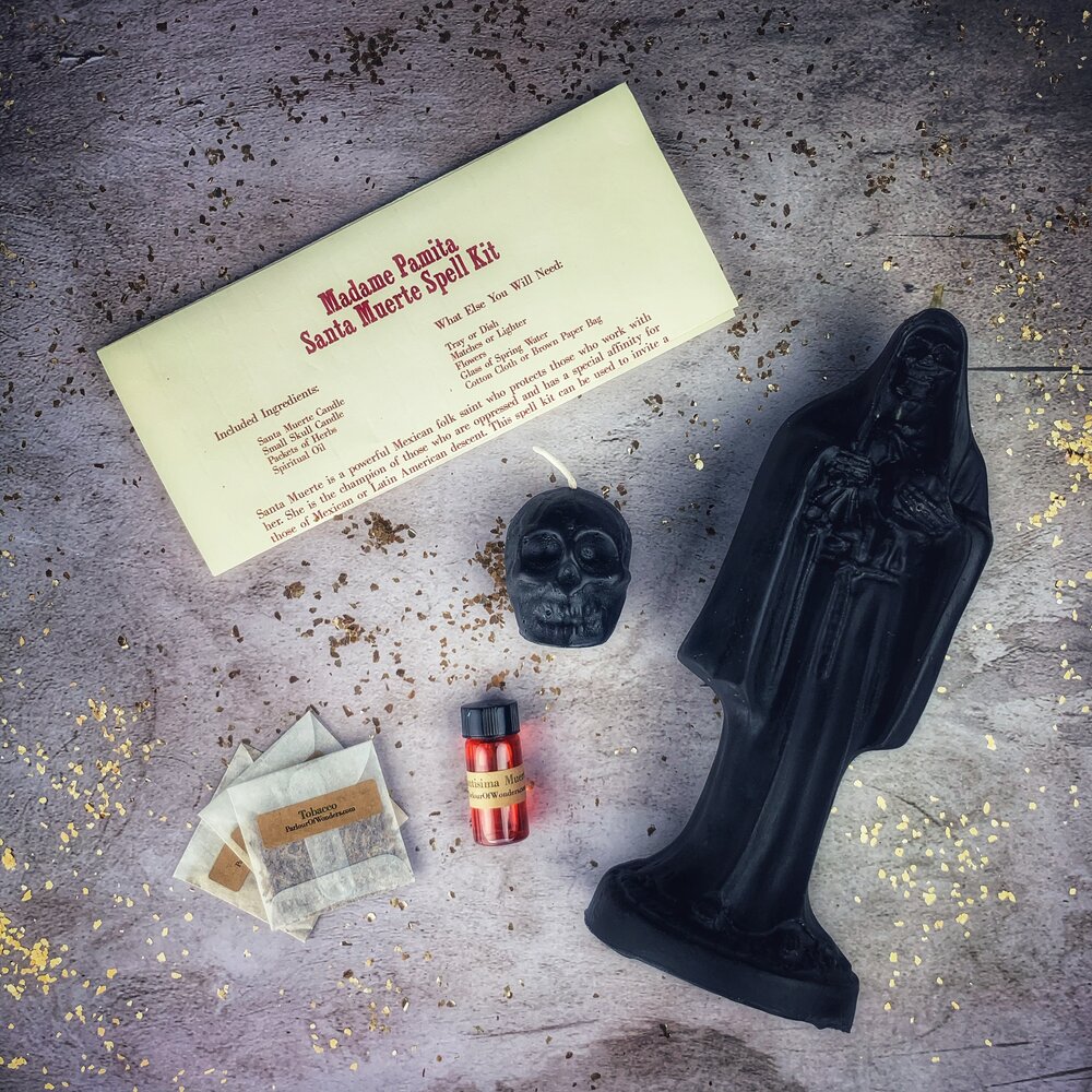 Red Santa Muerte Candle Spell Kit by Parlour of Wonders, featuring sacred folk saint devotion and protection elements.