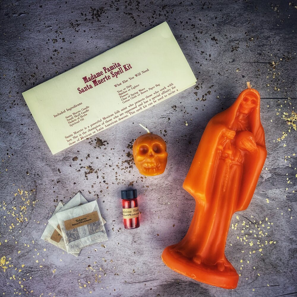 Santa Muerte Candle Spell Kit by Parlour of Wonders featuring a red candle for devotion and protection in a sacred folk tradition.