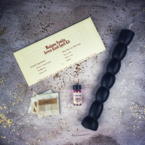 Red Passion Seven Knob Candle Spell Kit by Parlour of Wonders for seven-day manifestation magic, includes candles and ritual tools.