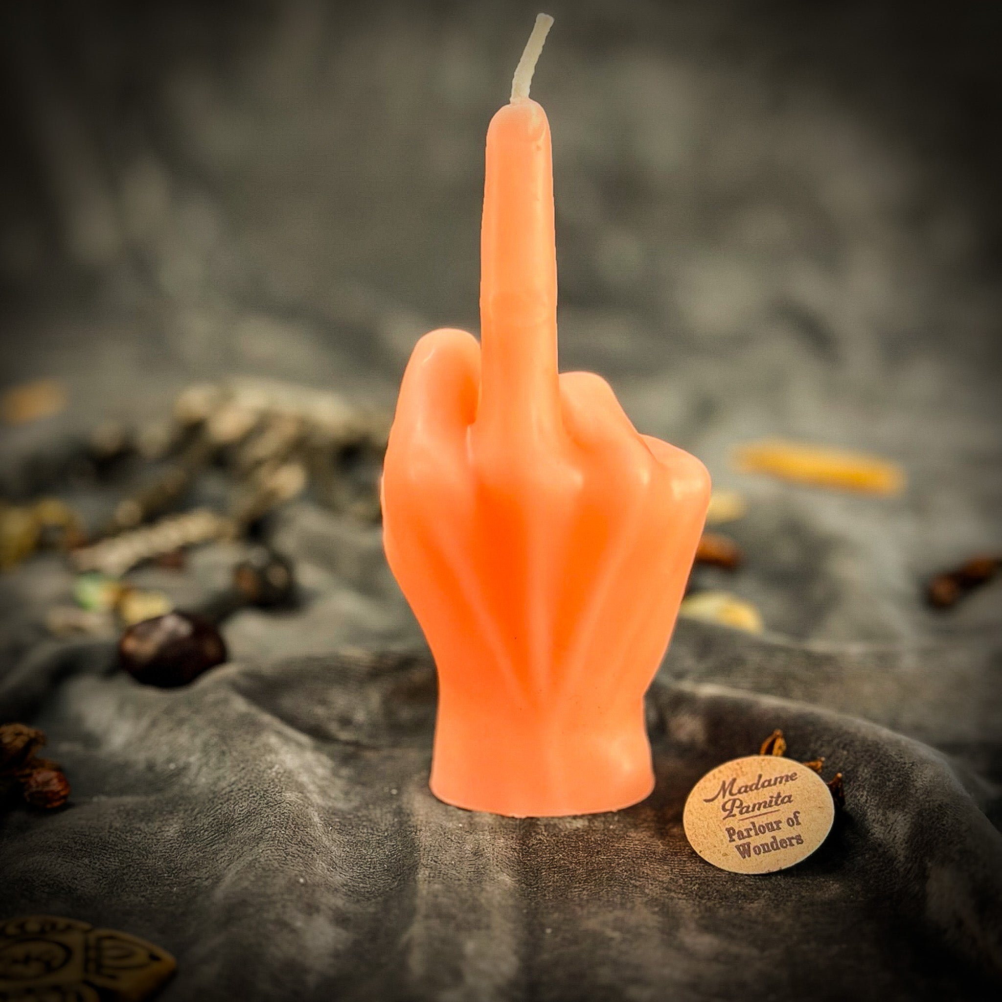 Red Middle Finger Candle Spell Kit by Parlour of Wonders for banishing and empowerment magic, featuring candles and ritual tools.