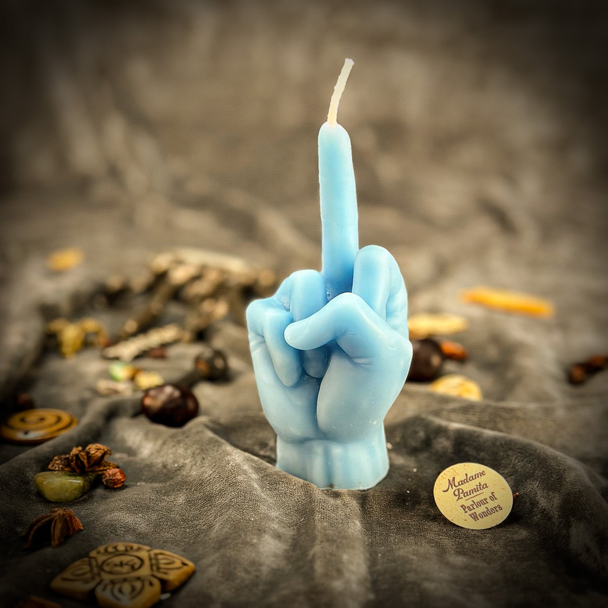 Red Middle Finger Candle Spell Kit by Parlour of Wonders for banishing and empowerment magic, featuring a bold, symbolic candle design.