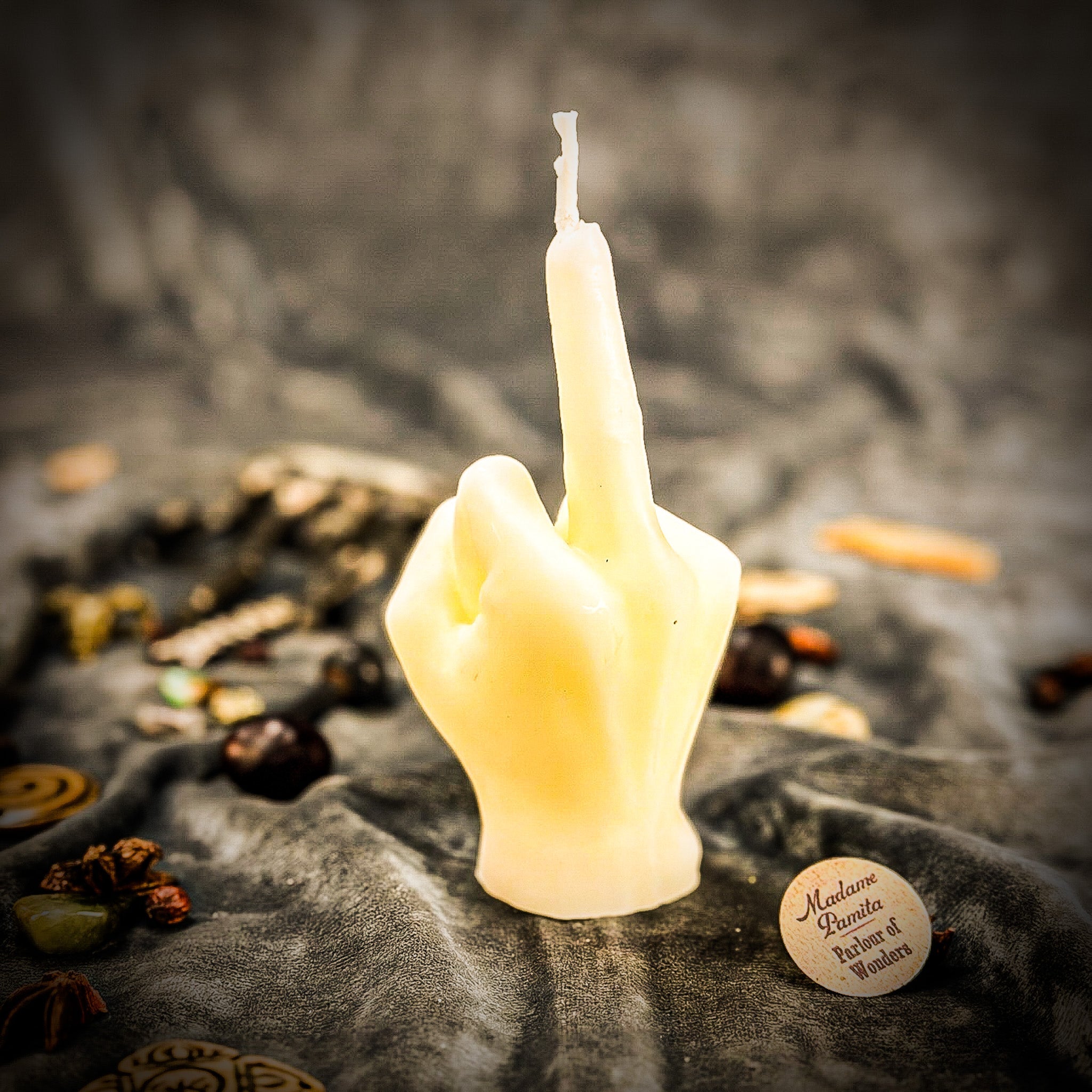 Red Middle Finger Candle Spell Kit by Parlour of Wonders for banishing and empowerment magic, featuring a bold candle for spiritual rituals.