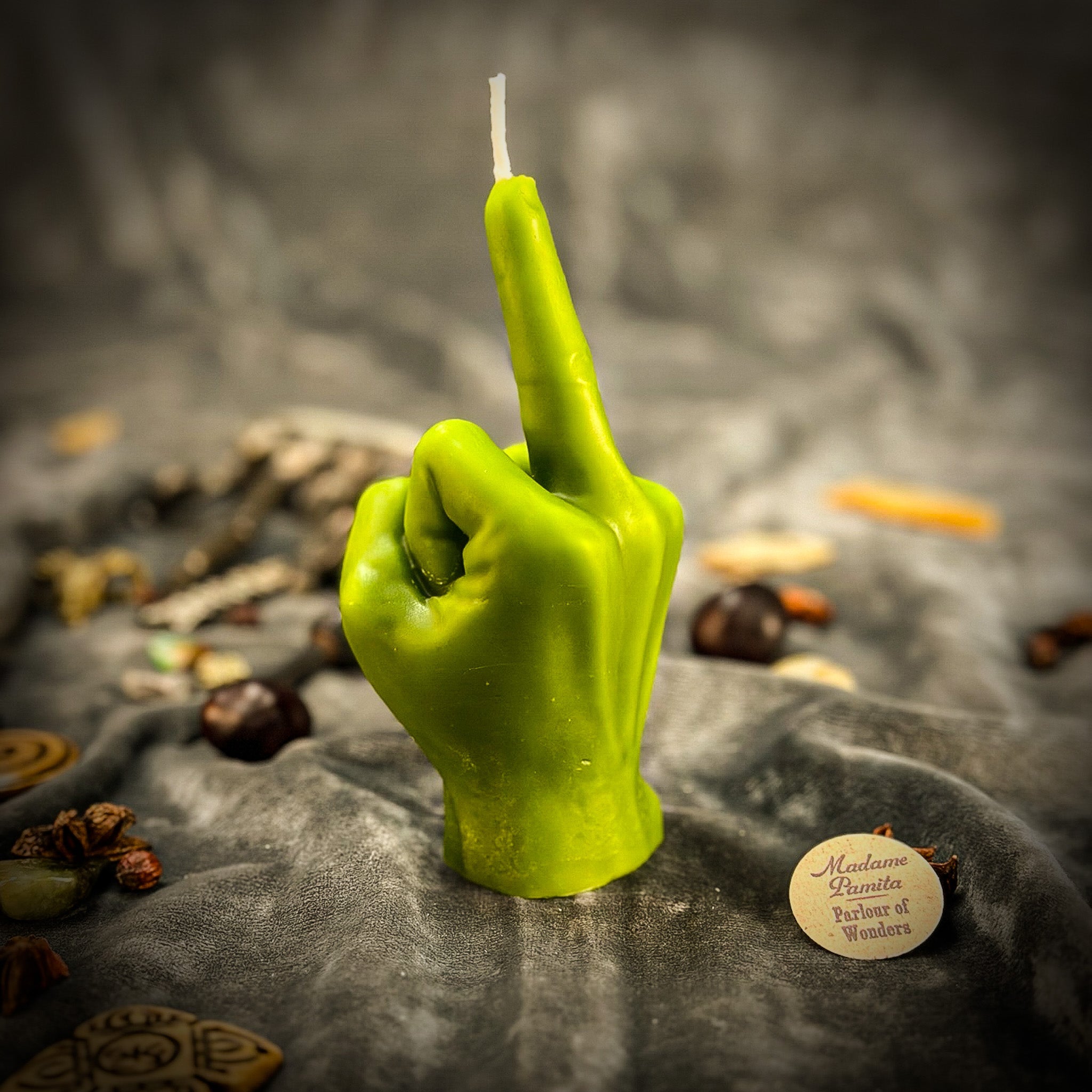 Red candle spell kit from Parlour of Wonders featuring a middle finger candle for banishing and empowerment magic.