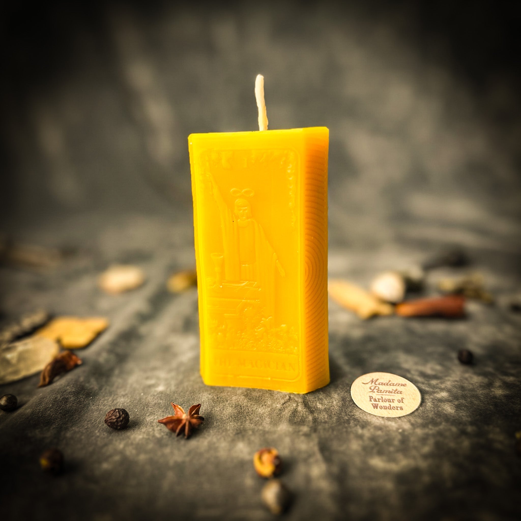 Parlour of Wonders Magician Candle Spell Kit with red candles for manifestation and willpower magic, featuring mystical symbols and herbs.