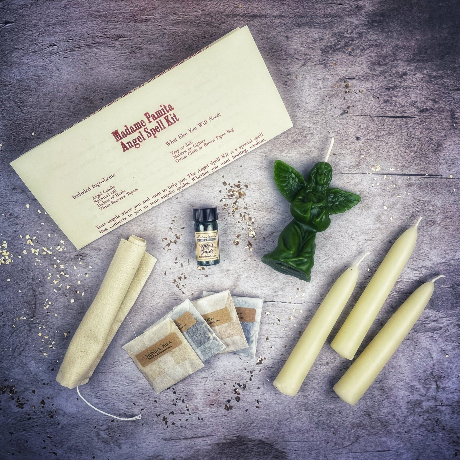 Red Angel Candle Spell Kit by Parlour of Wonders featuring candles and spiritual tools for connecting with spirit guides and divine blessings.