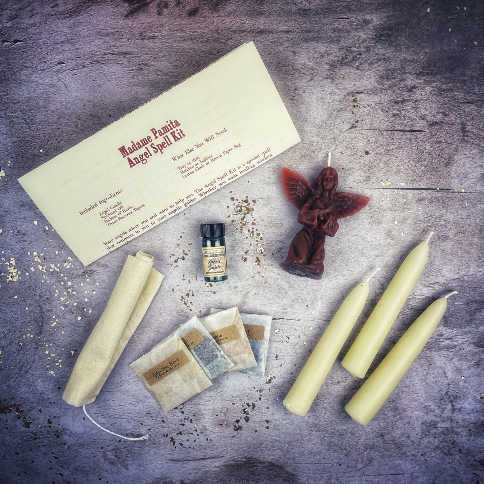 Parlour of Wonders Angel Candle Spell Kit with red candle and spiritual tools for connecting with spirit guides and divine blessings.
