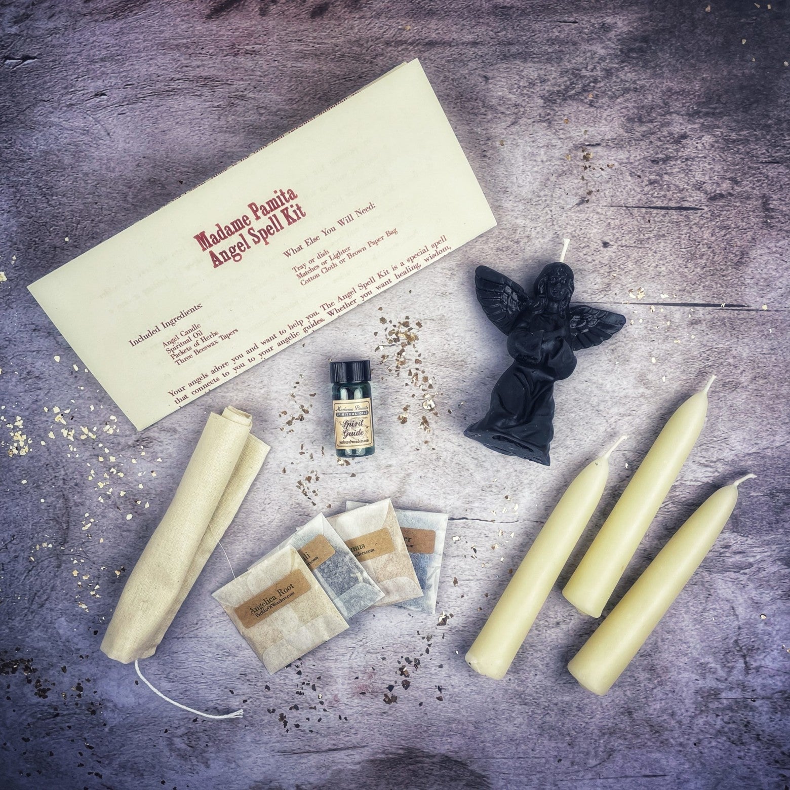 Parlour of Wonders Angel Candle Spell Kit with red Uriel angel candle and ritual tools for connecting with spirit guides and divine blessings.