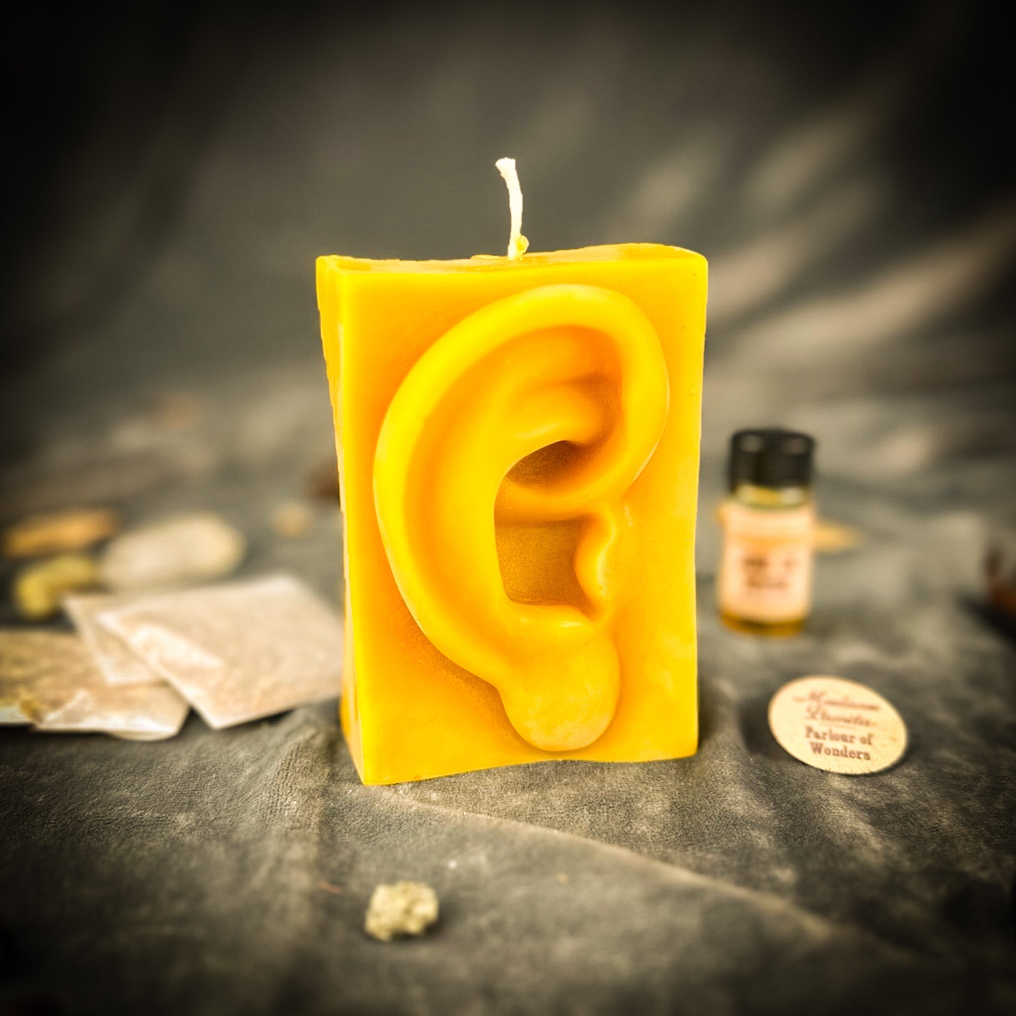 Ex Voto Ear Candle Spell Kit by Parlour of Wonders, featuring yellow candles for listening and clairaudience magic.
