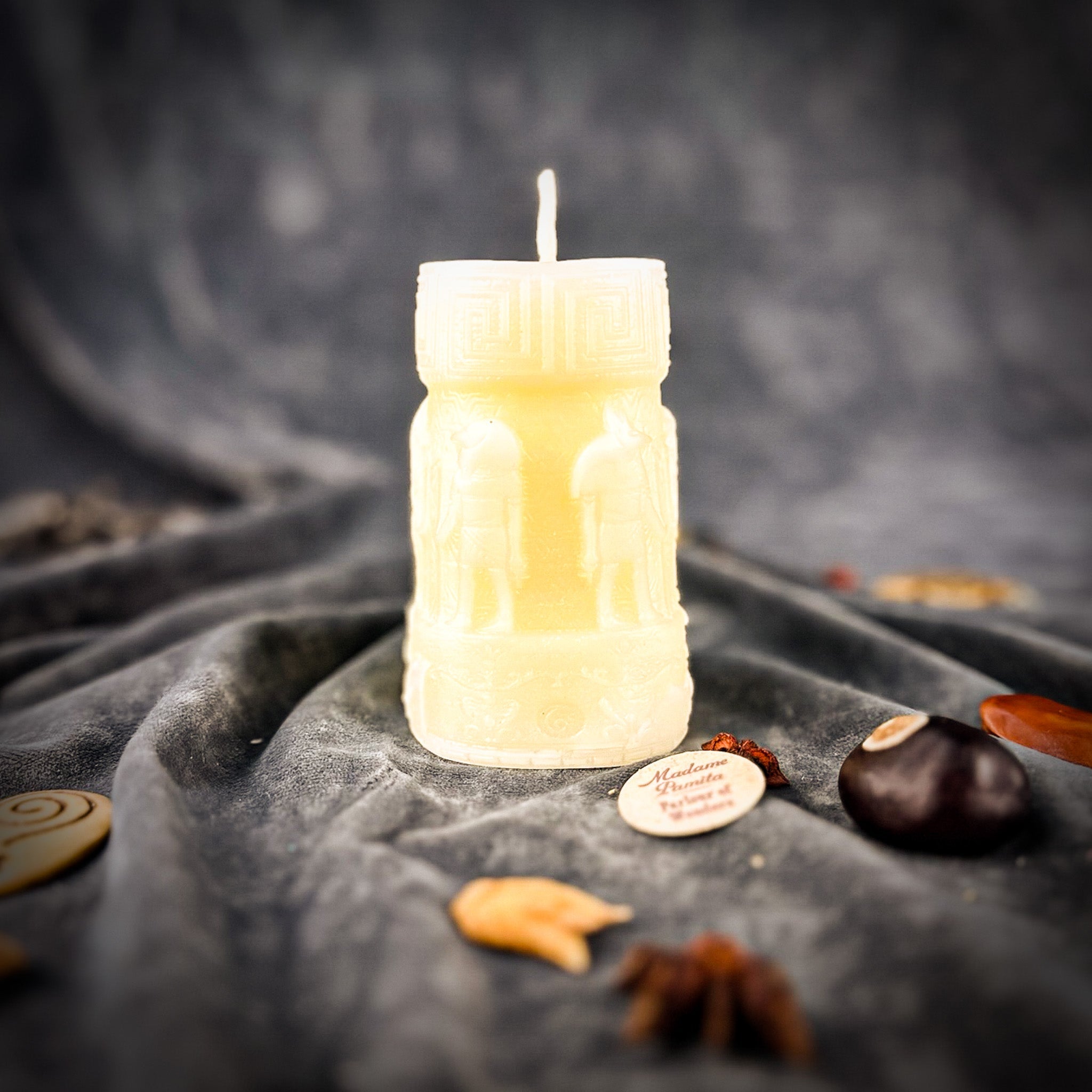 Egyptian Pillar Candle Spell Kit with Anubis and Horus figures, used for protection and divine guidance, by Parlour of Wonders.