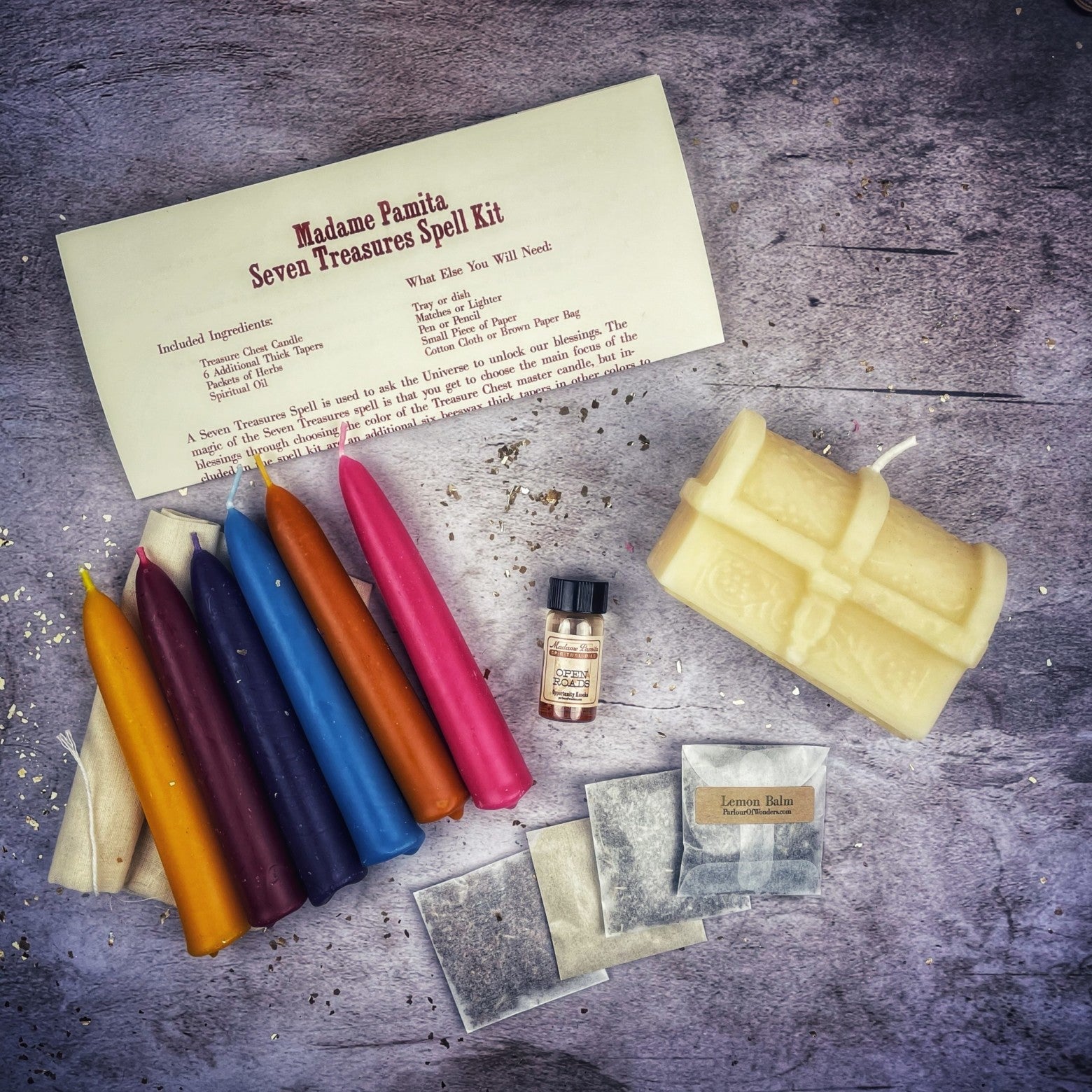 Parlour of Wonders Seven Treasures Candle Spell Kit with yellow candles for blessings and abundance.