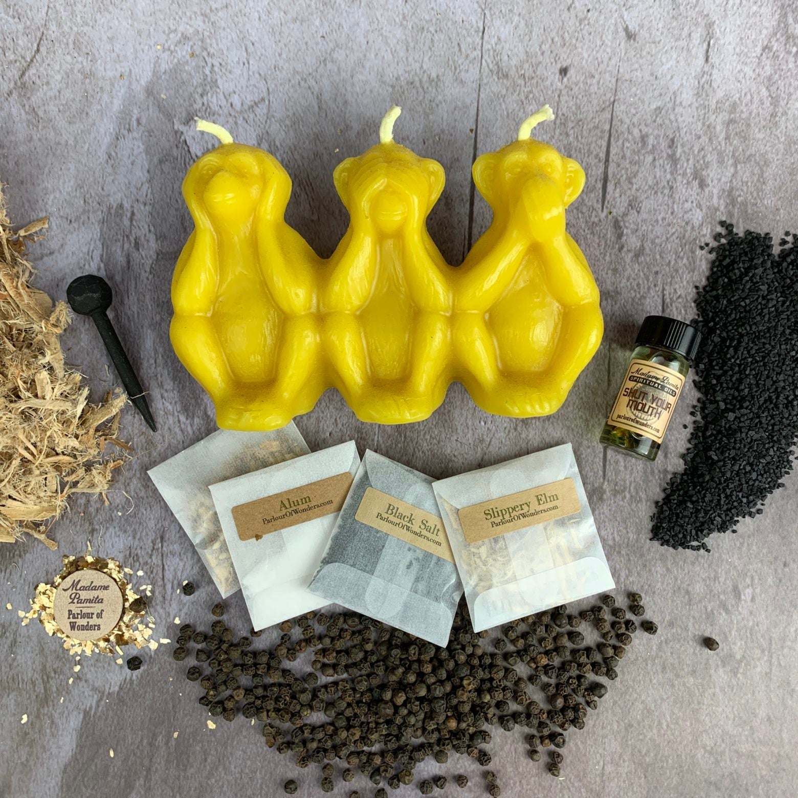 Parlour of Wonders Stop Jealous Gossip Candle Spell Kit with yellow candle for silence gossip and protect reputation.