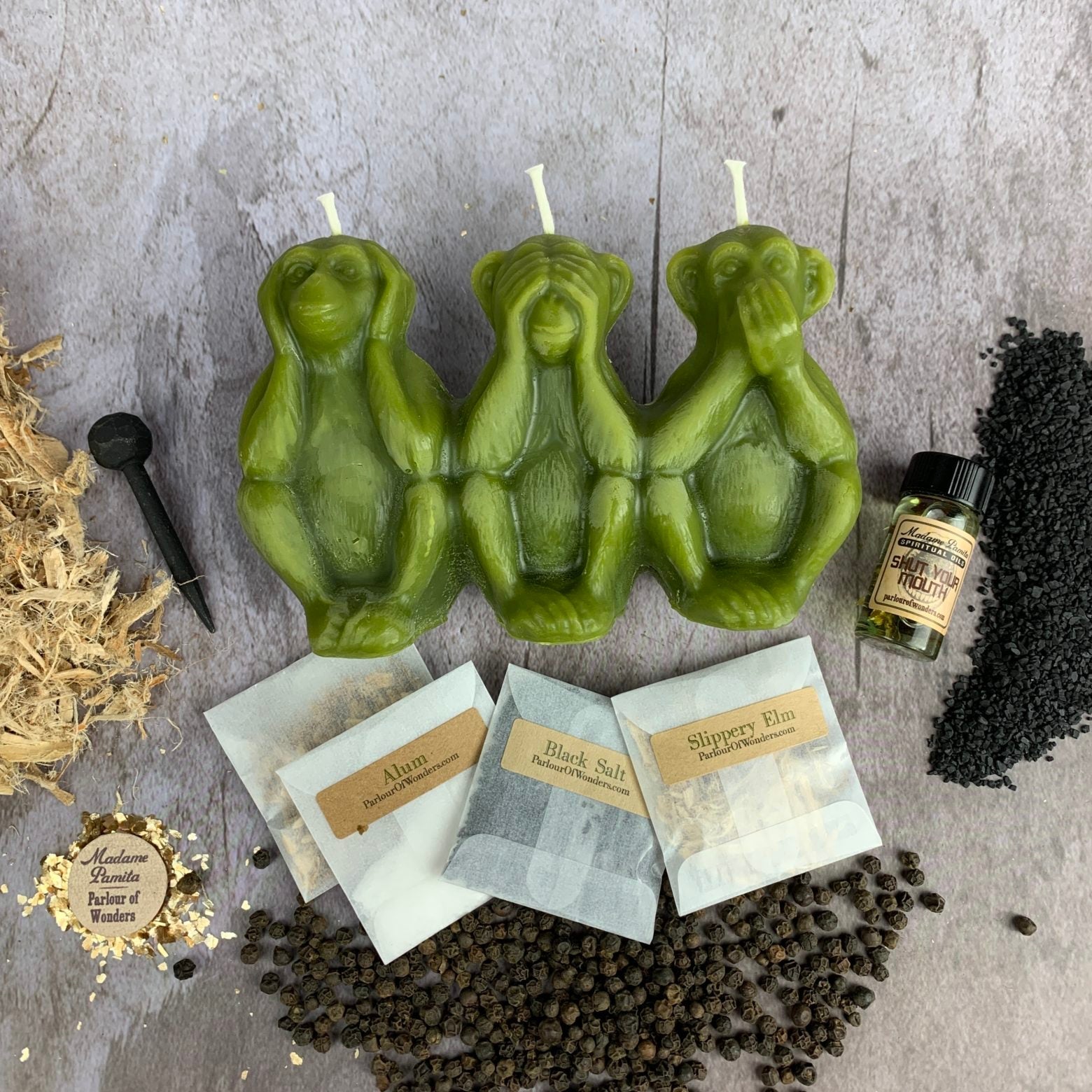 Parlour of Wonders Stop Jealous Gossip Candle Spell Kit with yellow candle for silencing gossip and protecting reputation.
