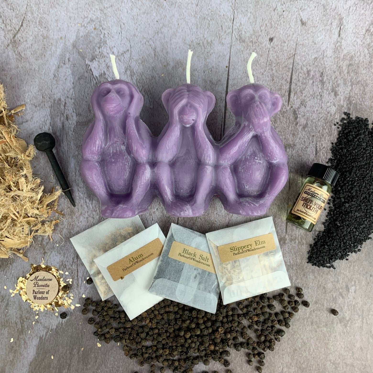Parlour of Wonders Candle Spell Kit with yellow candles for stopping gossip, silencing jealousy, and protecting reputation.