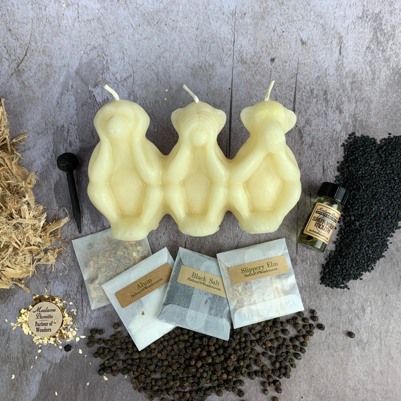 Parlour of Wonders Stop Jealous Gossip Candle Spell Kit with yellow candles for silencing gossip and protecting reputation.