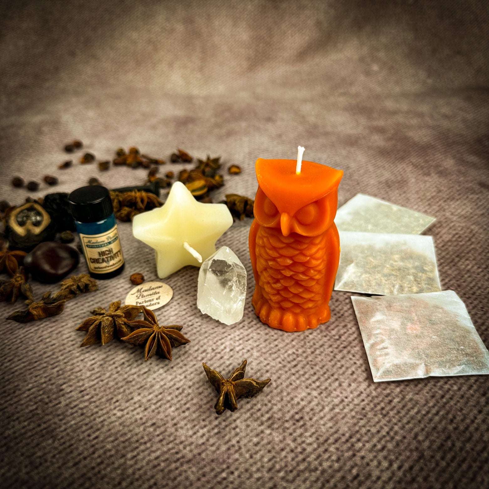 Wise Owl Wishing Star Candle Spell Kit by Parlour of Wonders, featuring yellow candles and symbols for wisdom and success.