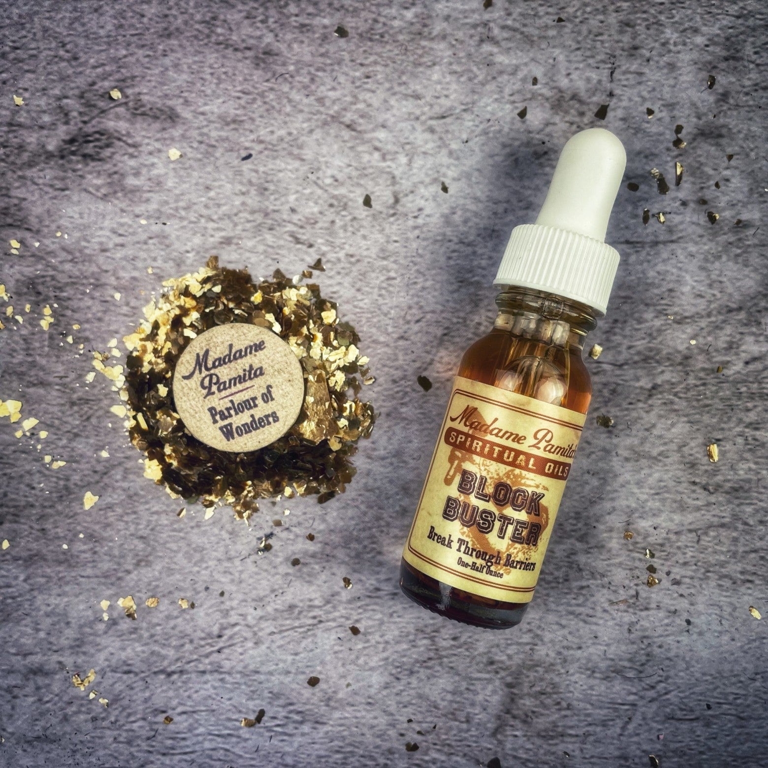 Block Buster Oil by Madame Pamita, a small glass bottle with herbal-infused oil, designed for spiritual use.