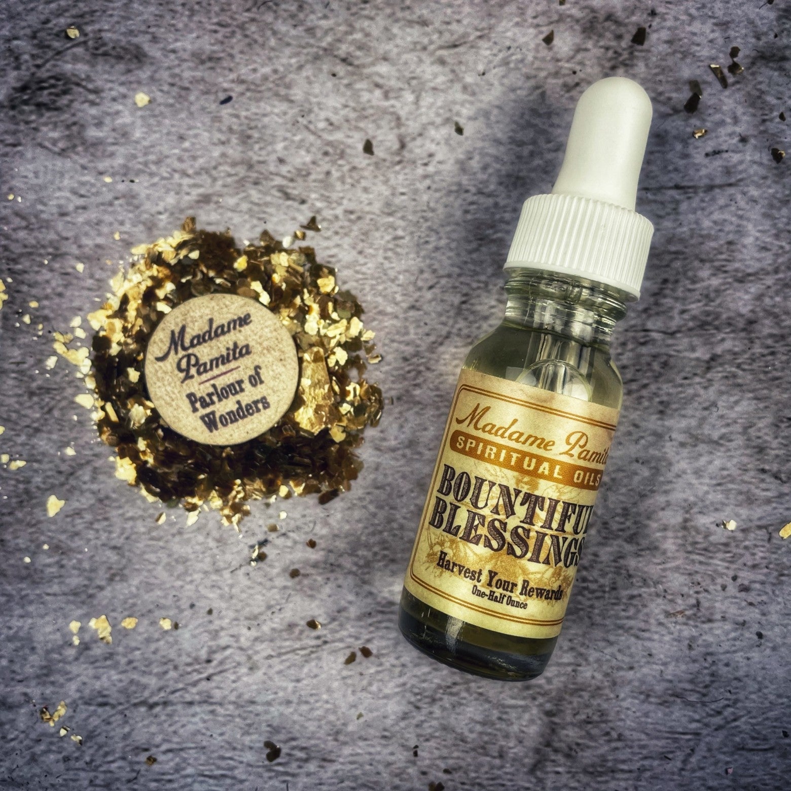 Bountiful Blessings Oil by Madame Pamita from Parlour of Wonders, featuring a glass bottle with golden oil and a decorative label.